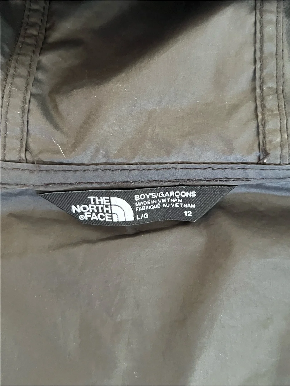 The North Face Kids Black Hooded Rain Jacket with Neon Green Print